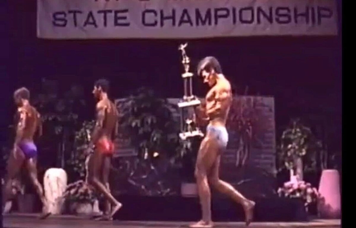 Dr. David Waring competing at a state bodybuilding championship during his NPC Mr. Michigan title years